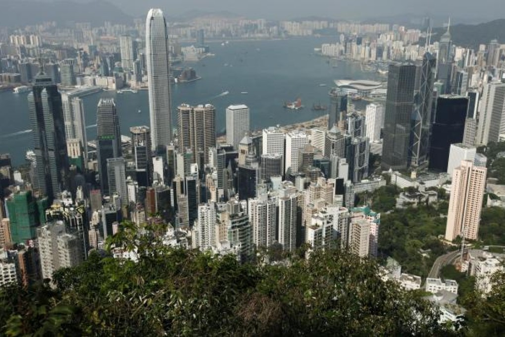 The Federation of Hong Kong Industries says the city's economy should enjoy growth of up to 4 per cent this year. Photo: EPA