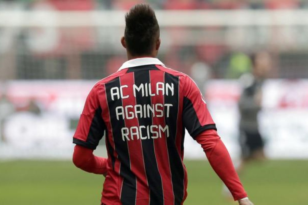 AC Milan midfielder Kevin Prince Boateng, of Ghana, sports a jersey reading "AC Milan against racism" prior to the start of the Serie A soccer match between AC Milan and Siena at the San Siro stadium in Milan. Photo: AP