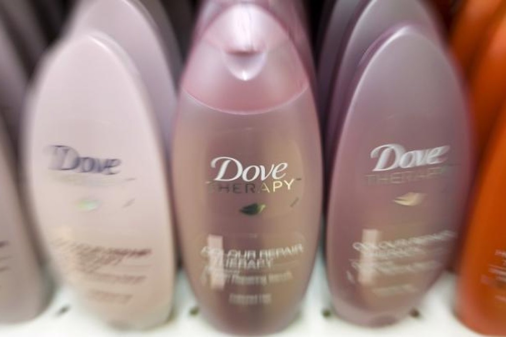 Bottles of Dove Therapy shampoo, produced by Unilever. Photo: Bloomberg