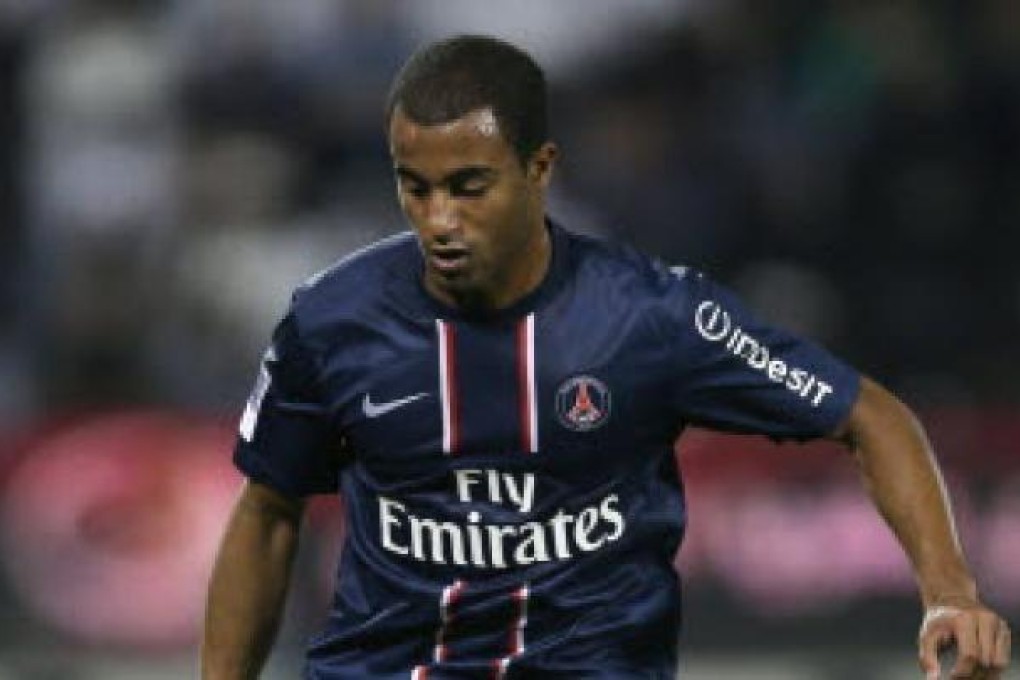 Paris Saint-Germain's (PSG) Brazilian midfielder Lucas Moura controls the ball during a friendly football match against Qatar's Lekhwiya in Doha. Photo: AFP