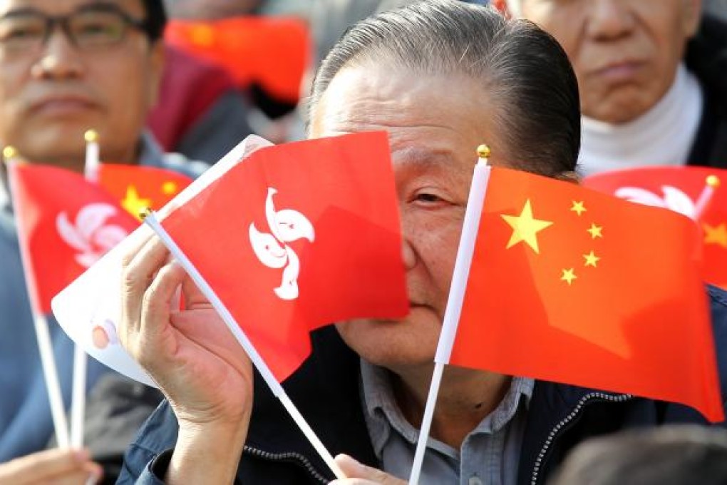 Hundreds of people join rally to support Chief Executive Leung Chun-ying in the government headquarters, Tamar. Photo: Dickson Lee