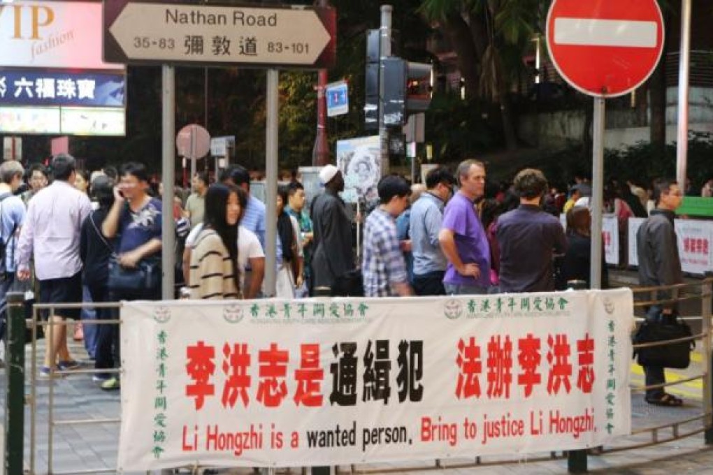 These anti-Falun Gong banners have been erected in Nathan Road. Photo: SCMP