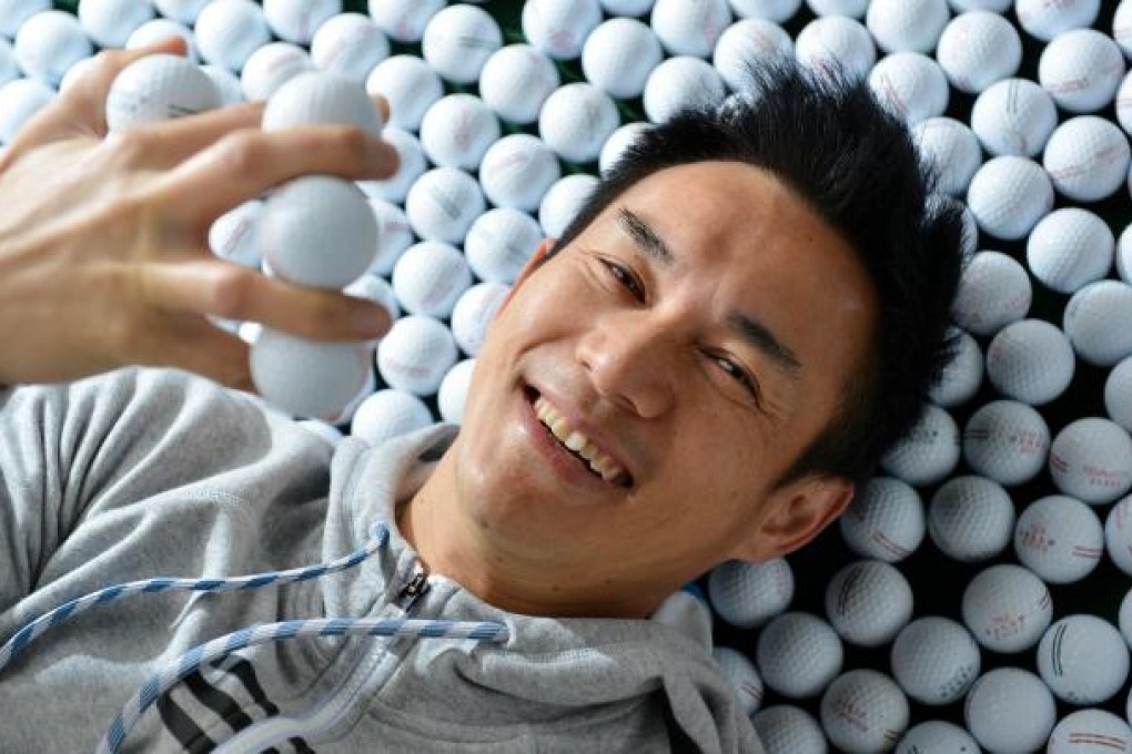 Brian Cha is up to his neck in golf balls as he ponders the tough Guinness World Record challenge ahead of him. Photo: Thomas Yau