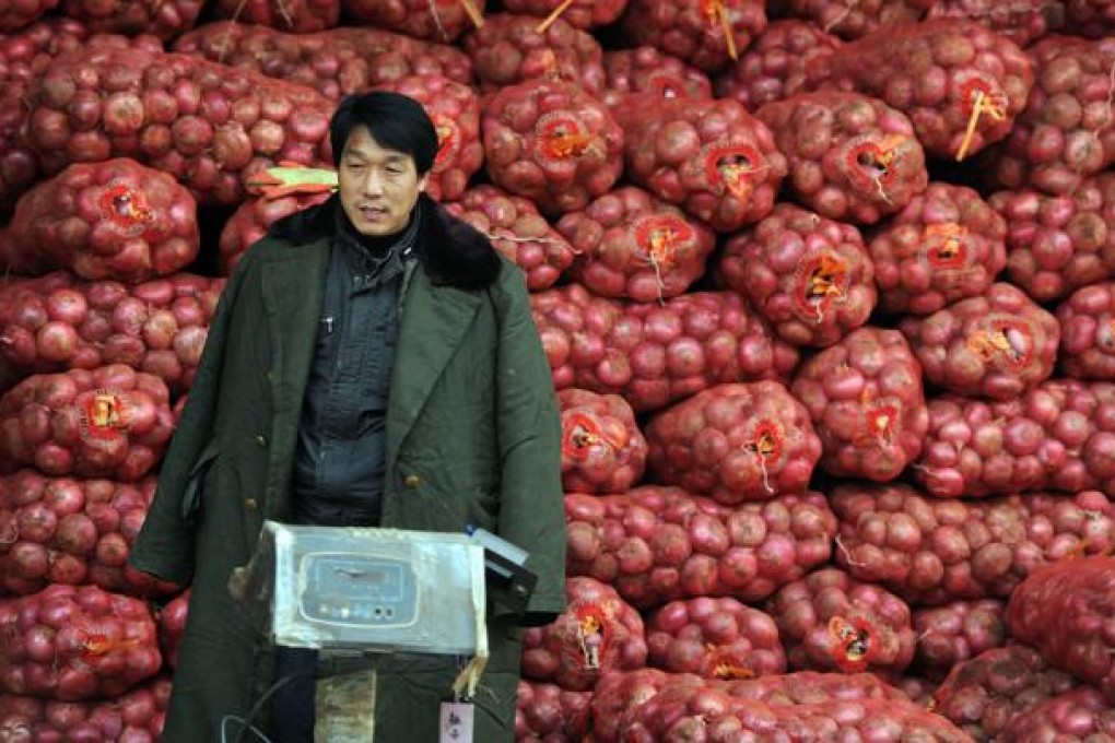 Inflation, trade push yuan to 19-year US$ high. Photo: AFP