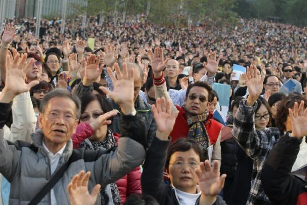 Protesters at the government headquarters, where organisers said 50,000 gathered. Police put the figure at 5,000. Photo: Edward Wong