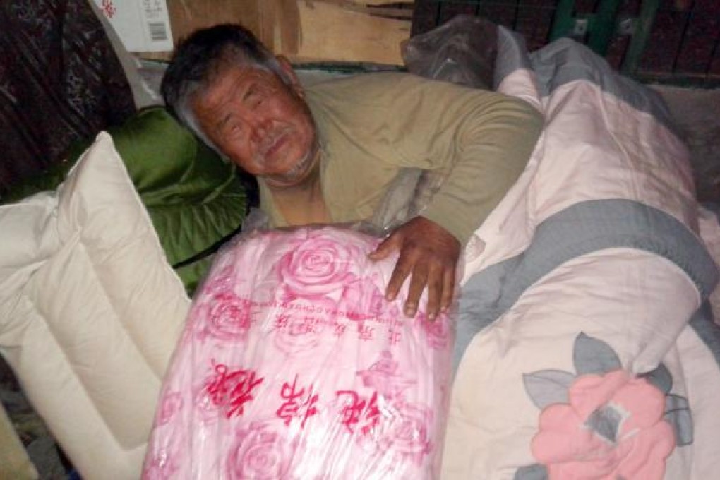 Warm bedding is a godsend to homeless people in Beijing grappling with the coldest winter in almost 30 years. Photo: SMP