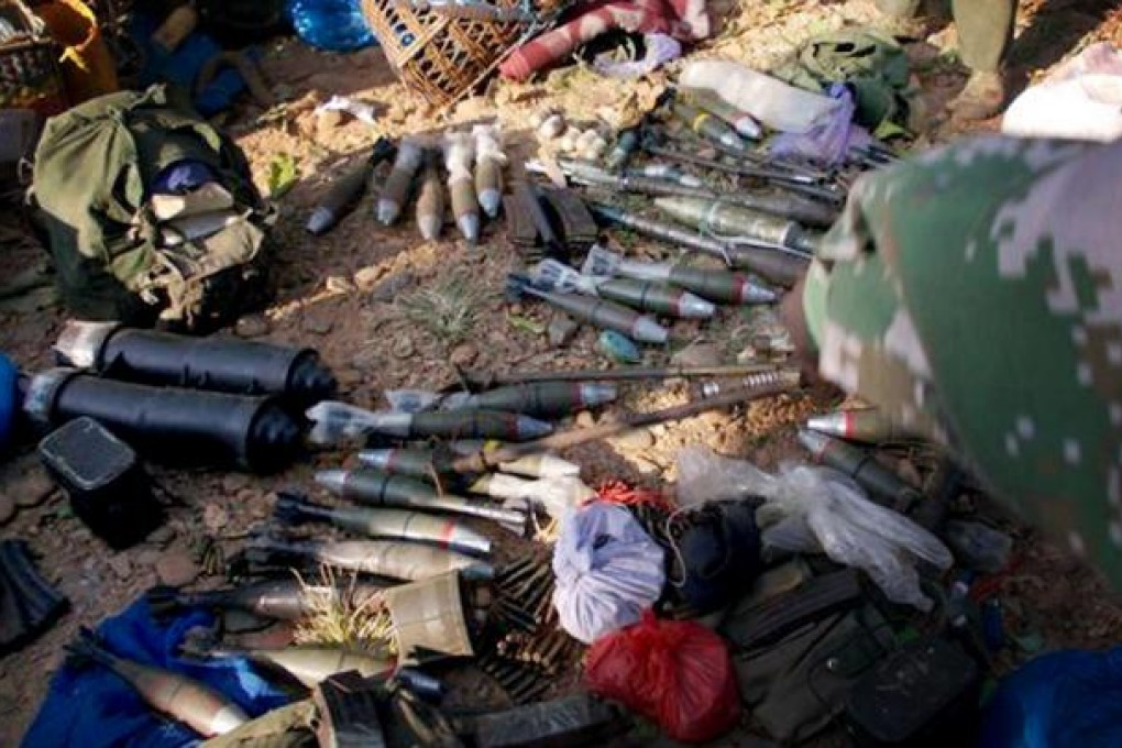 Kachin rebels display the ammunitions they seized from Myanmar soldiers in Laiza, northern Myanmar, last month. Photo: AP