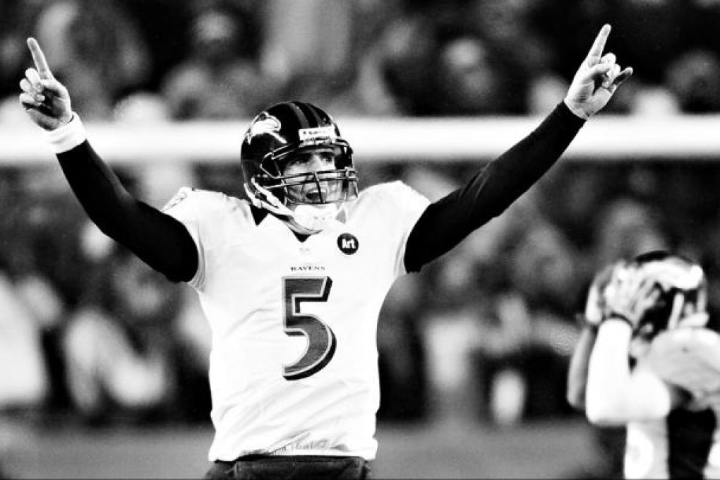 Baltimore Ravens quarterback Joe Flacco celebrates his 70-yard touchdown pass to Jacoby Jones late in the fourth quarter against the Denver Broncos. Photo: MCT
