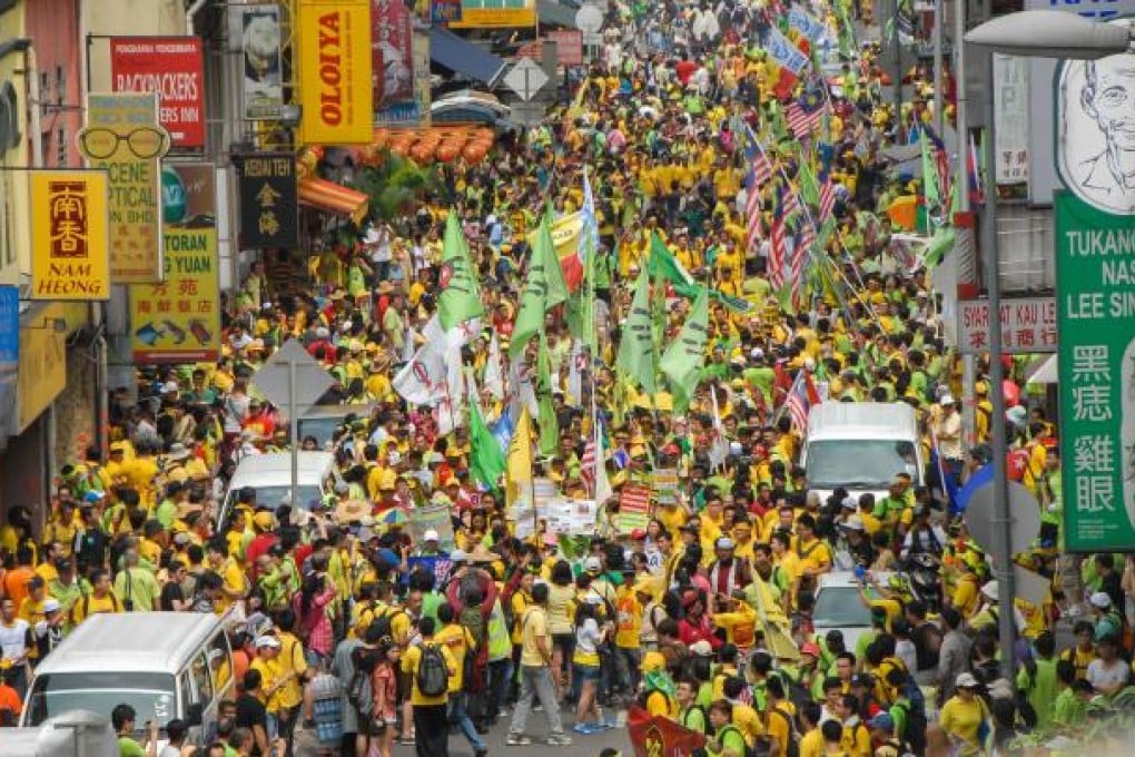 Demonstrators march towards Independence Stadium on Saturday to attend the opposition People's Uprising Assembly in Kuala Lumpur, Malaysia. Photo: Xinhua