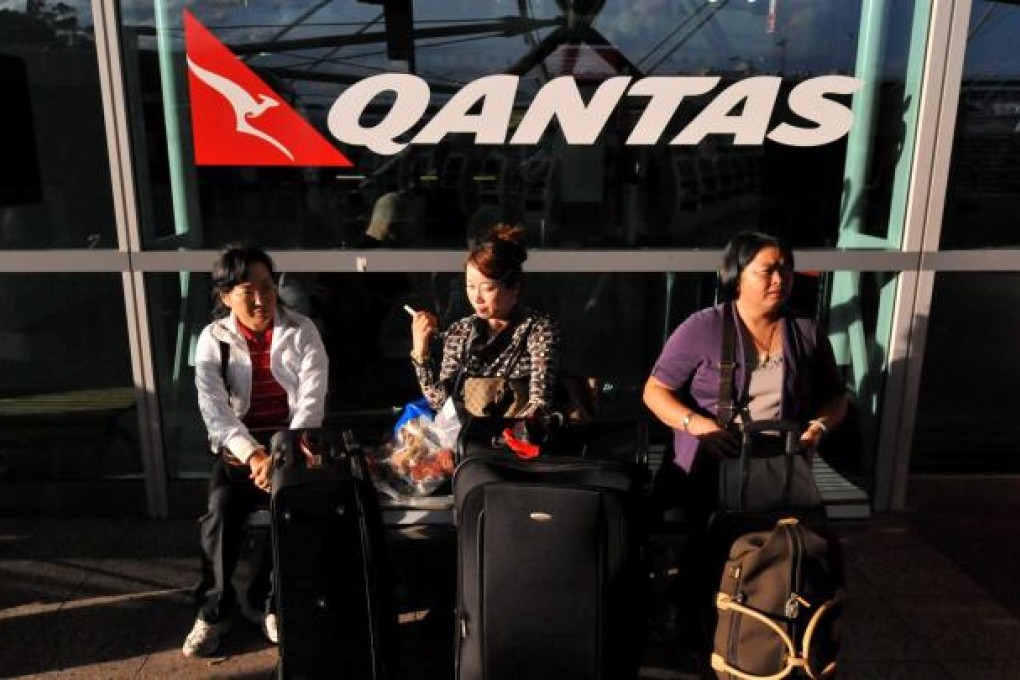 Cathay Pacific Airways may see a tougher fight for transiting passengers following Qantas Airways' alliance with Emirates. Photo: EPA