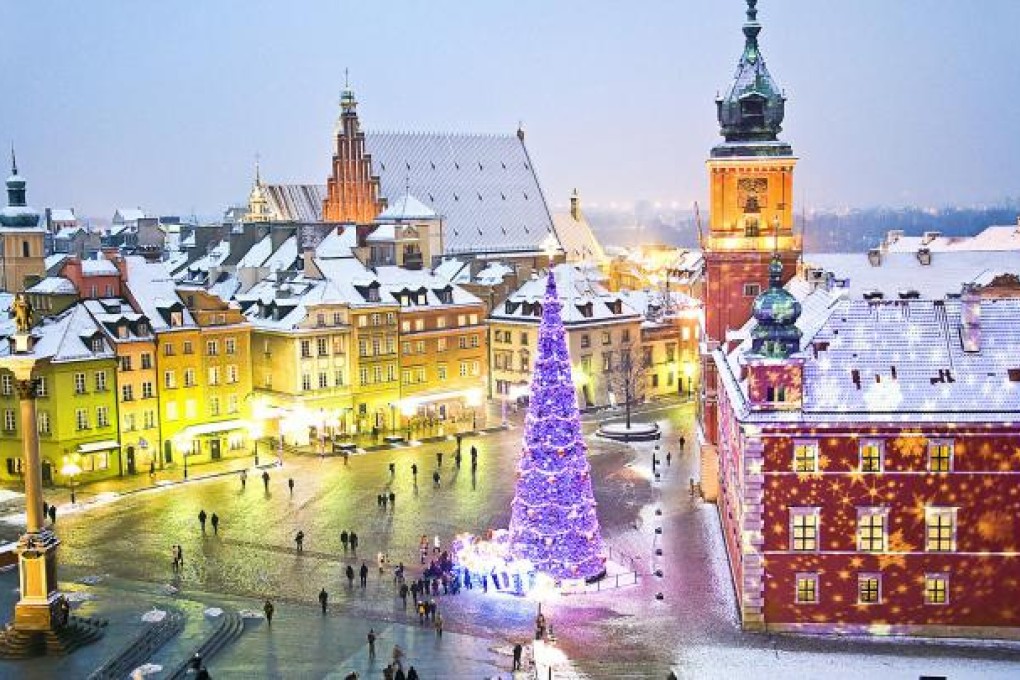 The Royal Castle (right) in Old Town.