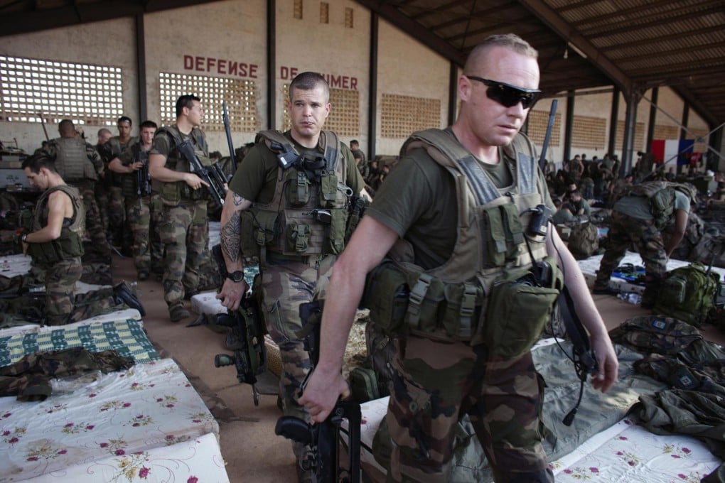 French soldiers at a Malian army air base in Bamako. France has poured hundreds of troops into the capital to prevent its capture by Islamist forces. Photo: Reuters