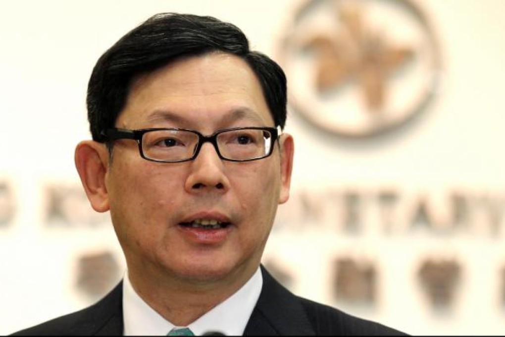 Monetary Authority chief executive Norman Chan says the authority will negotiate with the mainland for higher investment quotas. Photo: Edward Wong