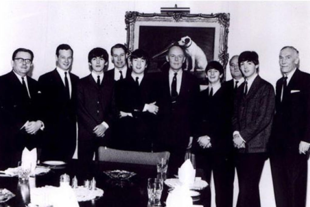 The Beatles with HMV officials and Nipper in the background. Photos: SCMP Pictures