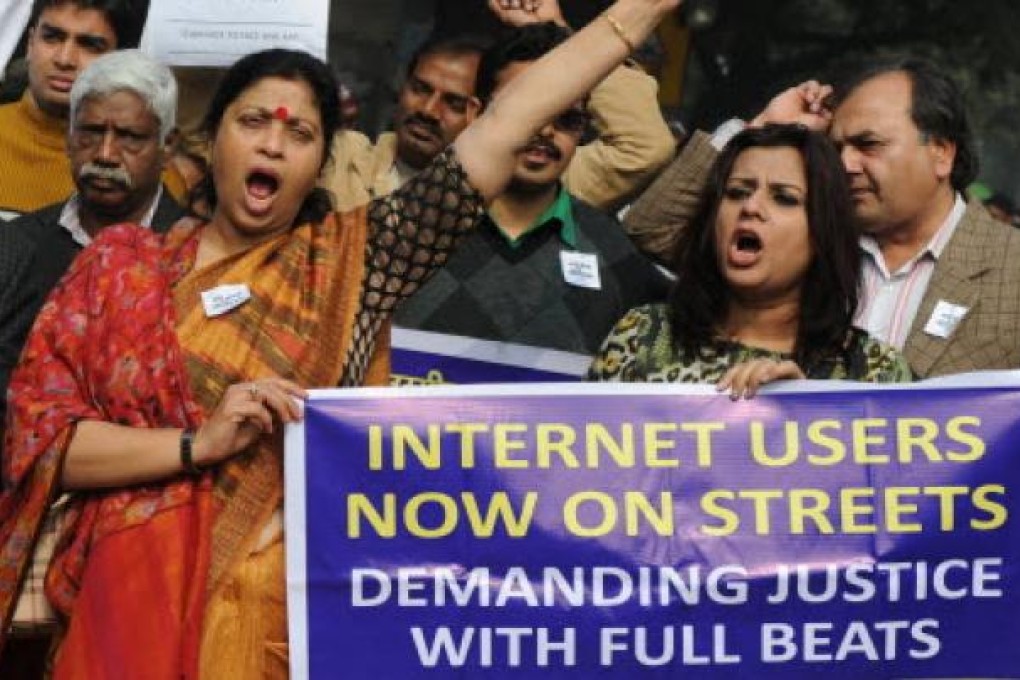 Indian activists hold banners and shout slogans during a protest against the rape in New Delhi. Photo: AFP