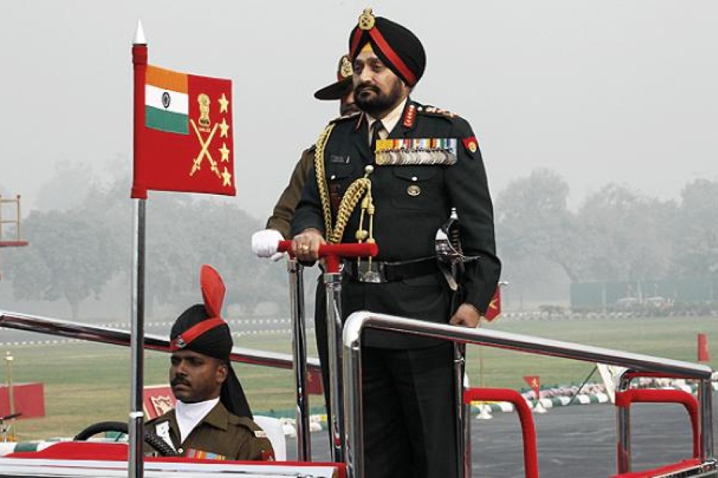 Indian Army General Bikram Singh inspects a guard of honour during the Army Day parade in New Delhi. Photo: Reuters