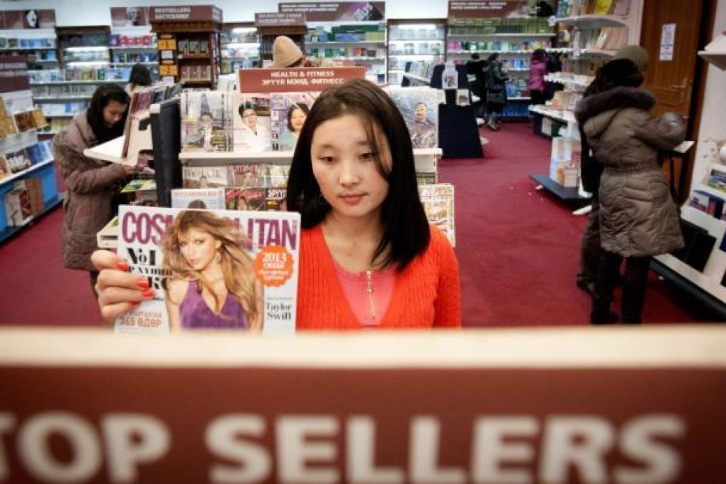 Mongolian women have taken to magazines like Cosmopolitan which has built up a circulation of 5,000 copies. Photo: AFP