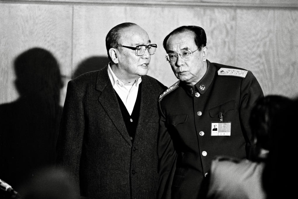 Yang Baibing (right) with his half-brother Yang Shangkun, then Chinese president, at the Great Hall of the People in 1991. Photo: China Foto Press
