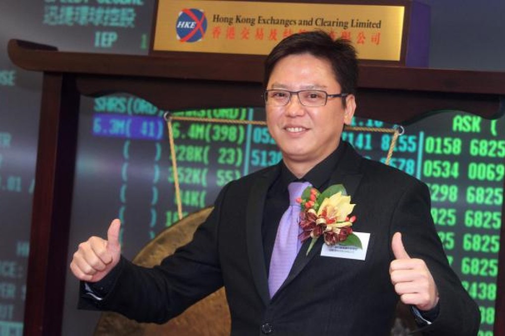 Speedy Global chief executive Huang Chih-shen gives two thumbs up for the firm's stellar performance on its trading debut. Photo: Sam Tsang