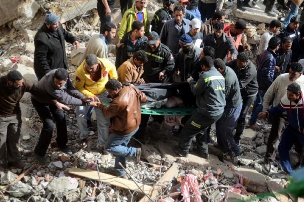 Rescuers search for survivors in Alexandria, Egypt. Photo: EPA
