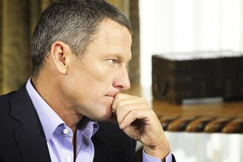 Lance Armstrong speaking with Oprah Winfrey in Austin. Photo: Reuters