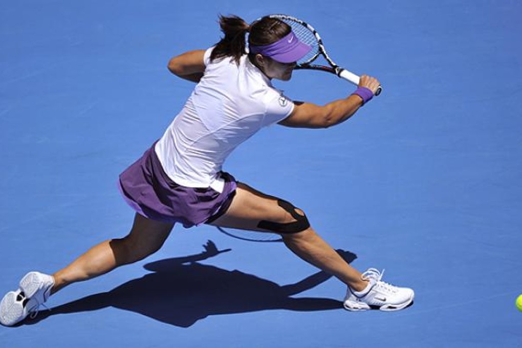 China's Li Na returns to Olga Govortsova of Belarus on the third day of the Australian Open. Photo: Xinhua