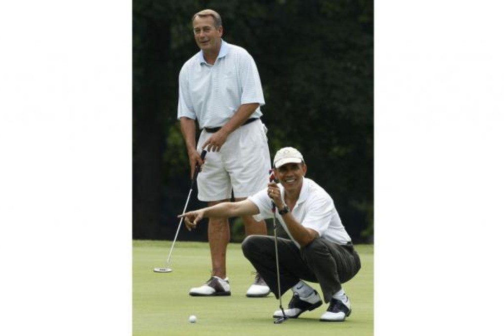 Obama with John Boehner.