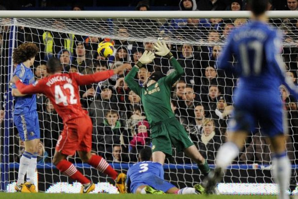 Southampton's Jason Puncheon scores his team's second goal against Chelsea during their match at Stamford Bridge. Photo: EPA