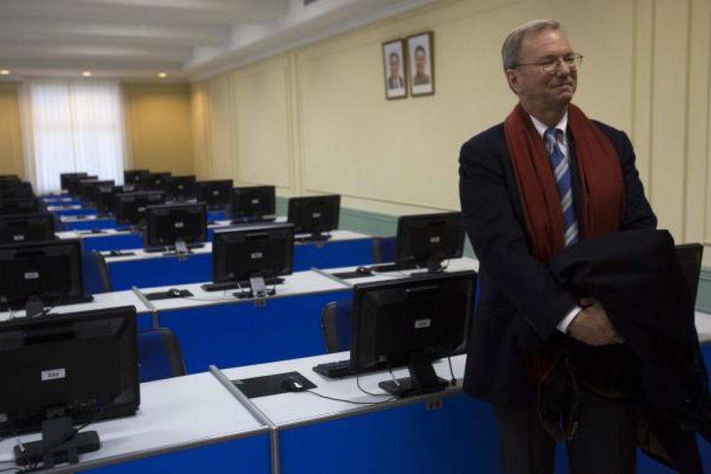 Eric Schmidt, Executive Chairman of Google, tours a computer lab at Kim Il Sung University in Pyongyang, North Korea. Photo: AP