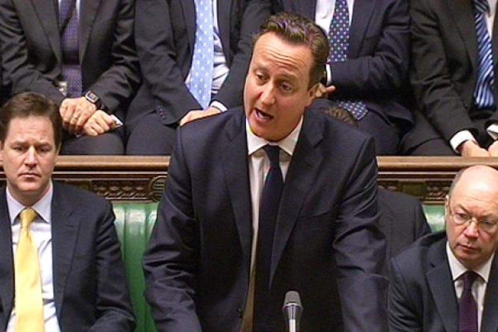 British Prime Minister David Cameron speaks to the British House of Commons, on Friday, where he expressed 'disgust and condemnation' at the 'brutal and savage attack' in Algeria. Photo: EPA