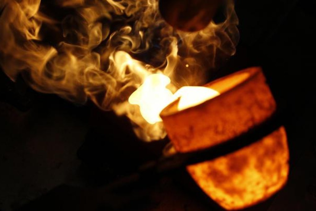 Liquid investment: gold is a good hedge against inflation but pays no dividends. Photo: Reuters