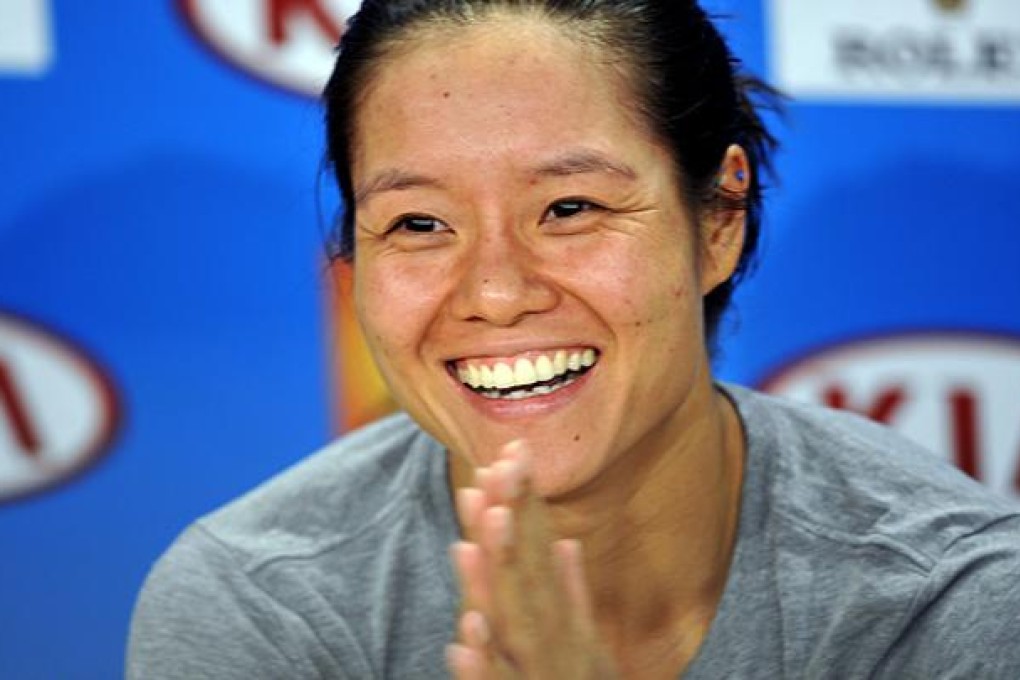 Li Na speaks at a press conference after her match against Sorana Cirstea of Romania in Melbourne. Photo: Xinhua