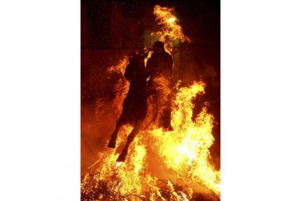 Horse and rider take part in an annual event. Photo: Reuters