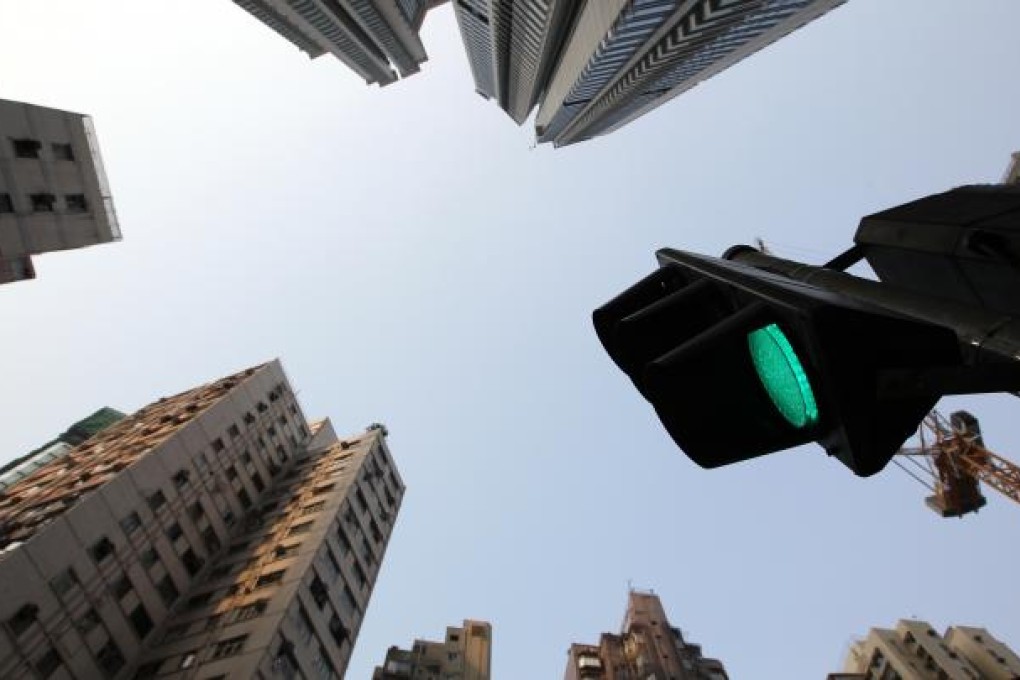 Leung Chun-ying to give a go-ahead for property development in Mid-levels area. Photo: Dickson Lee