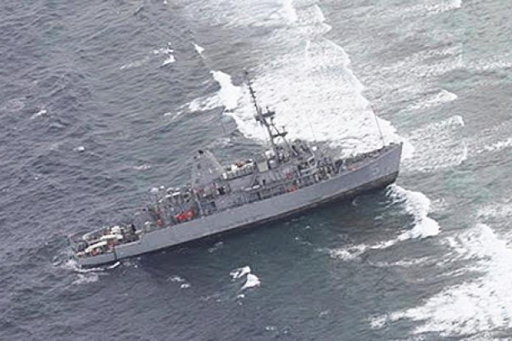 US Navy ship USS Guardian, which ran aground near Tubbataha Reef in the western Philippines. Photo: EPA