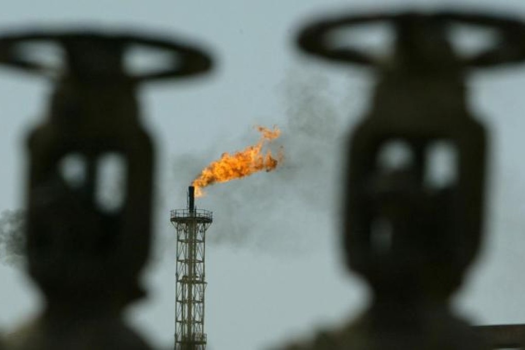 Oil firm forecasts that 70 per cent of global emissions will be from developing countries, and that China will depend on imports as the US becomes self-sufficient. Photo: Reuters