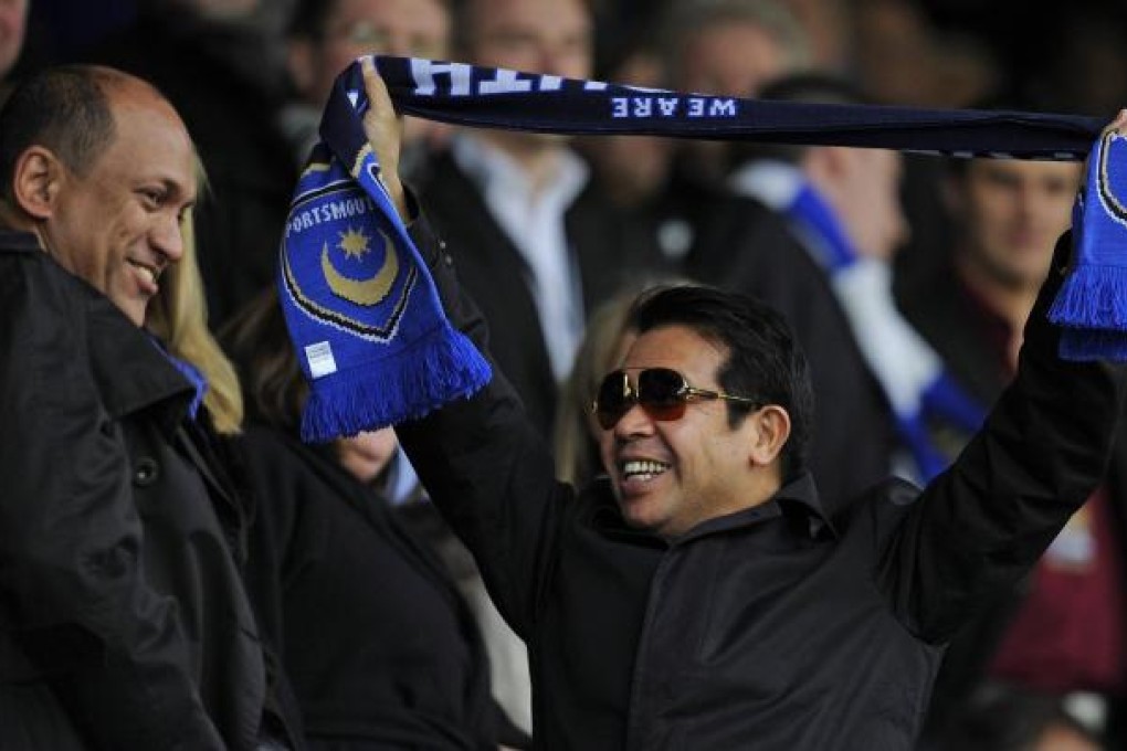 Balram Chainrai (left) and Carson Yeung at the cup match. Photo: AP