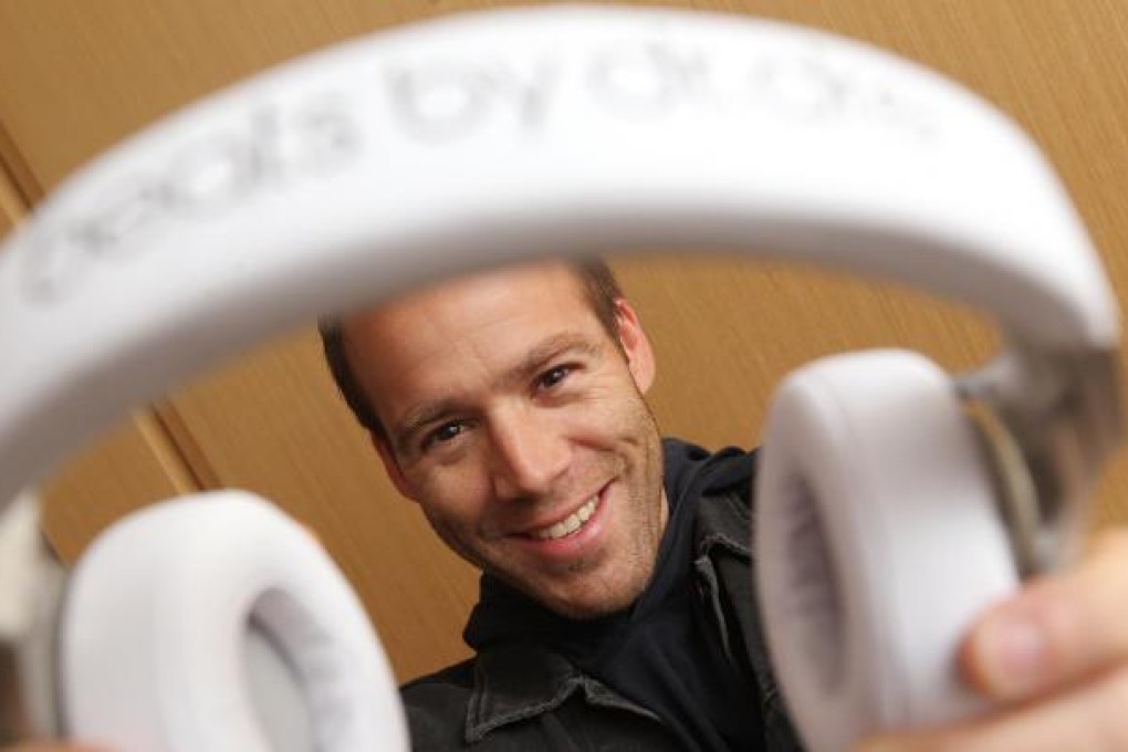 Beats Electronics president Luke Wood shows some of the headphone technology that has made the company a world leader. Photo: K.Y. Cheng