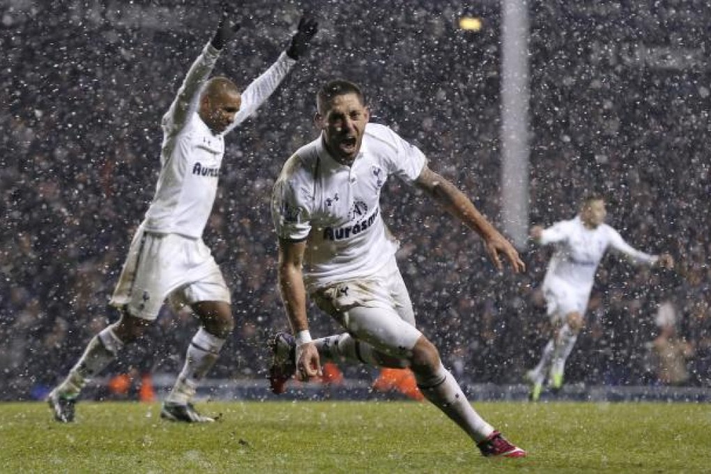 Tottenham Hotspur's Clint Dempsey is ecstatic after his 93rd-minute goal snatched a draw against Manchester United at White Hart Lane. Photo: AP