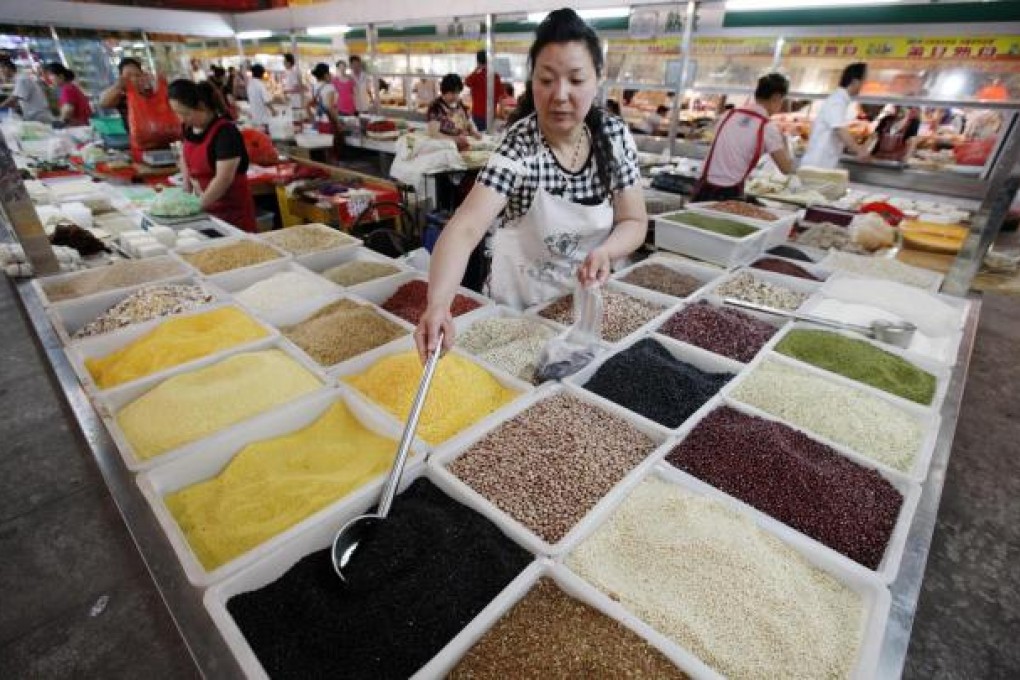 China is facing an explosive demand for proteins, which will put enormous pressure on the production of corn and soya beans. Photo: AFP