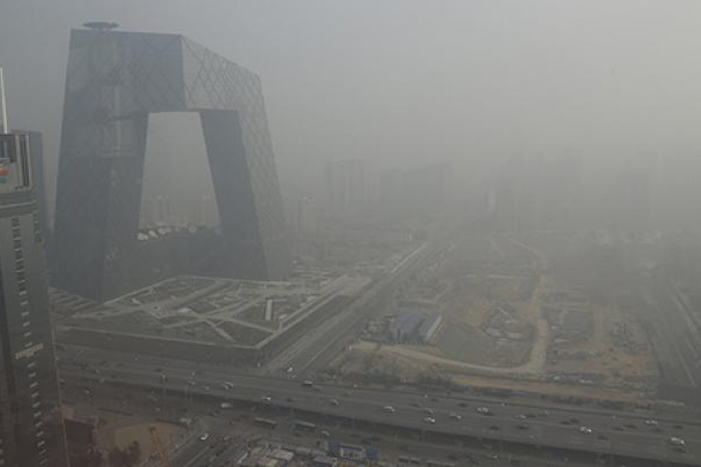 The China Central Television building amid the heavy haze of pollution experienced by Beijingers last week. Photo: Reuters