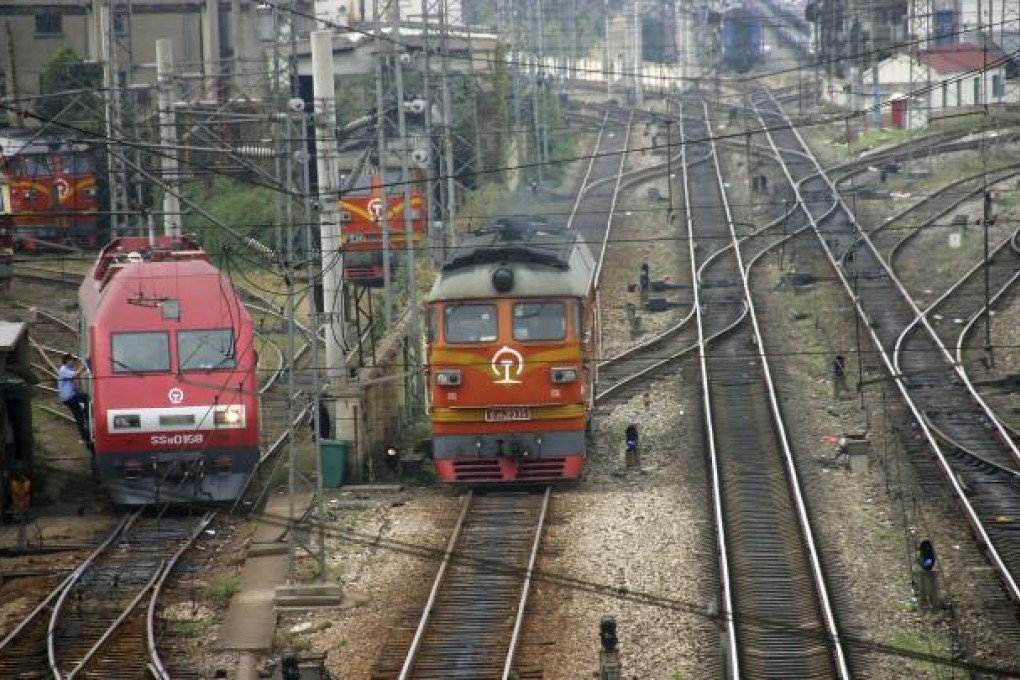Trains run on the Nanjing-Shanghai railway route in Nanjing, China. Photo: AP