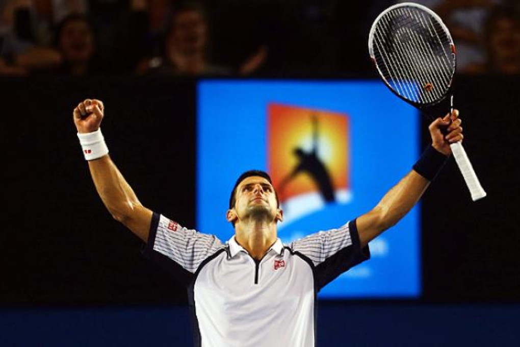 Novak Djokovic celebrates his quarter final win against Tomas Berdych. Photo: EPA