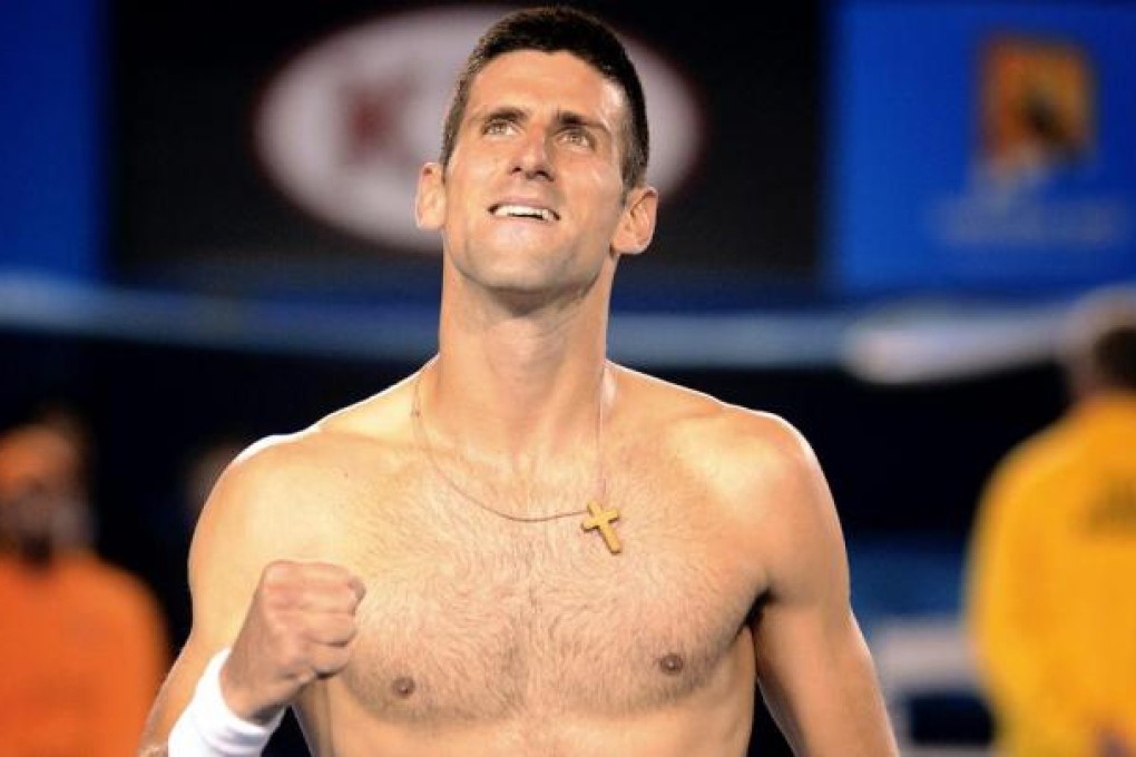 Novak Djokovic shows his relief after beating Stanislas Wawrinka in five sets. Photo: EPA