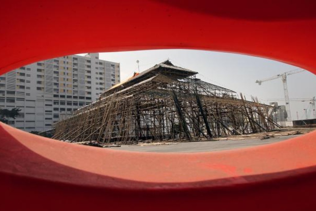 Workers work on the Bamboo Theatre at West Kowloon Cultural District. Photo: Edward Wong
