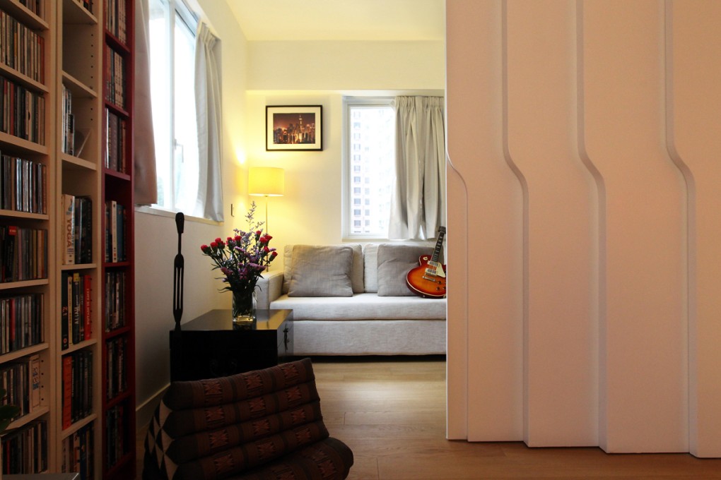 Doors: The sliding doors in the living area were designed by Parallel Lab and built by the contractor for HK$15,524. The sofa bed (HK$6,900) was from G.O.D. (various locations; www.god.com.hk) and the trunk was made by Yong Chang Antique Furniture for HK$1,000. The standing lamp (HK$300) was from Ikea. The floor cushion was bought in Thailand years ago, and the sculpture came from South Africa. Curtains throughout the flat were made by May On (37 Fleming Road, Wan Chai, tel: 2598 0031) for a total of HK$7,000.