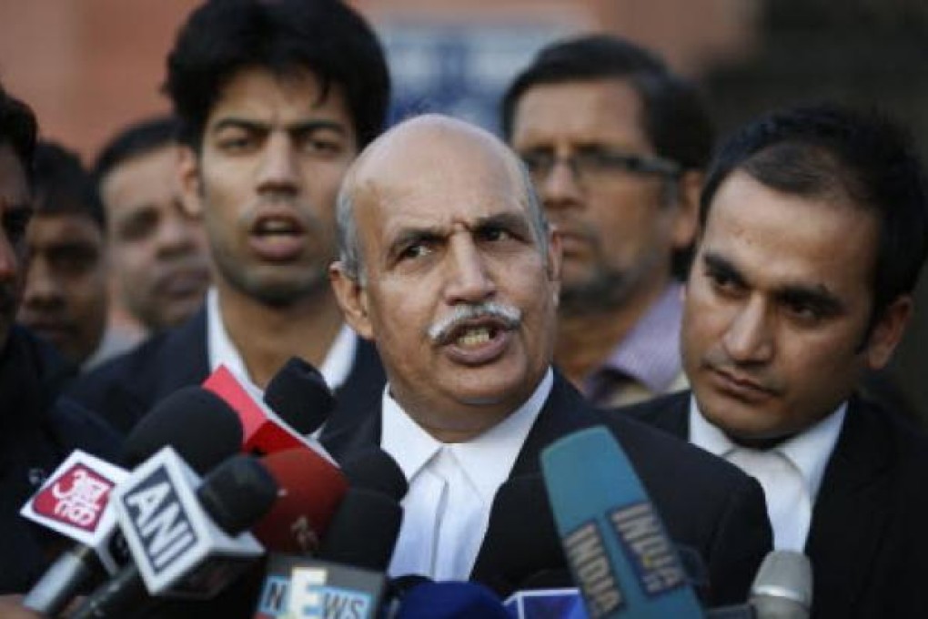 V.K. Anand, a lawyer for one of five men facing charges of rape and murder of a woman aboard a bus, outside a court in New Delhi on Monday. Photo