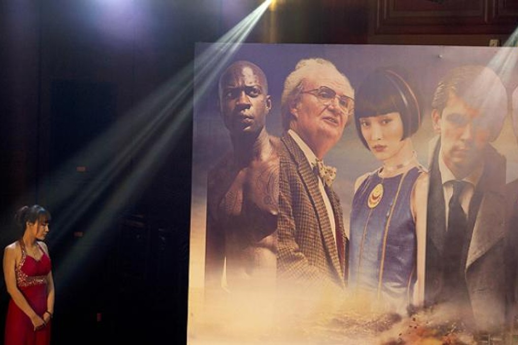 Publicity posters for "Cloud Atlas" at the movie's premiere in Beijing. Photo: AP