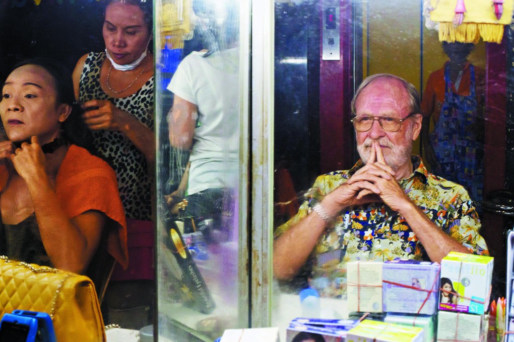 Jerry Hopkins in the dressing room of a ladyboy bar in Bangkok's Nana Plaza. Photo: Meg Hewitt