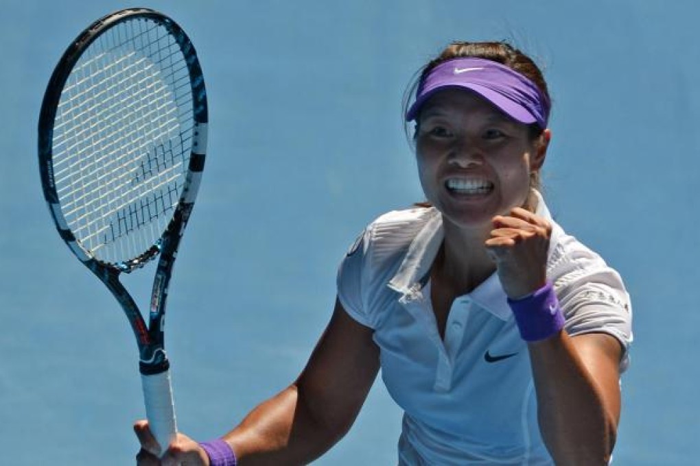 Chinese ace Li Na celebrates after stunning Russia's Maria Sharapova 6-2, 6-2 in their singles semi-final in Melbourne yesterday. Photo: AFP